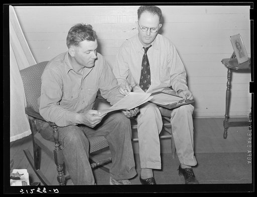 Mrs. Helms working out farm plan with FSA (Farm Security Administration) supervisor. Coffee County, Alabama