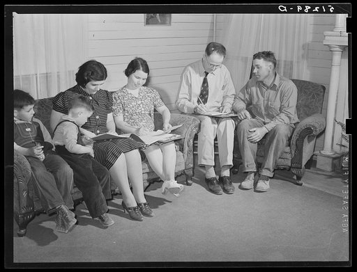 Helms family working out farm and home plan with FSA (Farm Security Administration) supervisor. Coffee County, Alabama