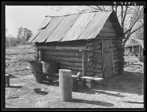 Smokehouse and washhouse built by rehabilitation family. Pike County, Alabama