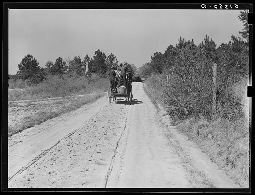 Untitled photo, possibly related to: Former tenant moving into new house where he will be a day laborer. Southern Georgia