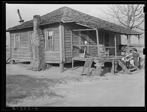 Mrs. Lewis and children talking with home economist, Miss Maddox, on steps of their home. R.R. (Rural Rehabilitation)  family. Coffee County, Alabama