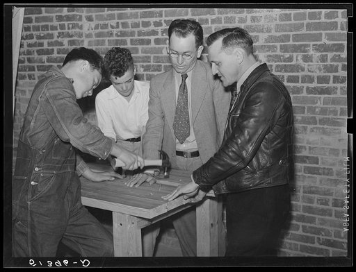 Vocational teacher and school principal help the boys make a large table in shop at Goodman School. Coffee County, Alabama