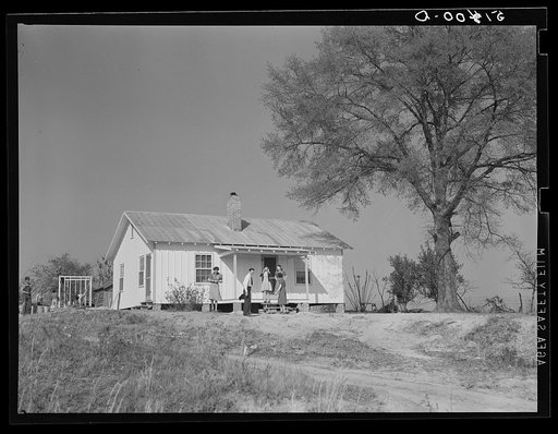 Miss Chrisitan and Miss Hesterley, home supervisors leaving new home of J.A. Veasy after meeting of Clark Hill Club. Coffee County, Alabama