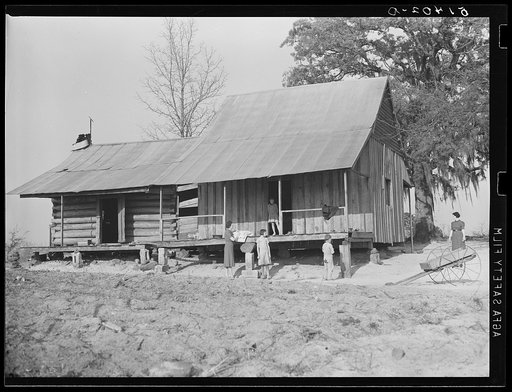House of J.D. Smith R.R. first year, mother has been dead eight years. Thirteen year old girl, Gladys, cares for two-room house and six in family. Miss Christian, home supervisor, is bringing her sheeting, water must be carried from neighbors. Coffee County, Alabama