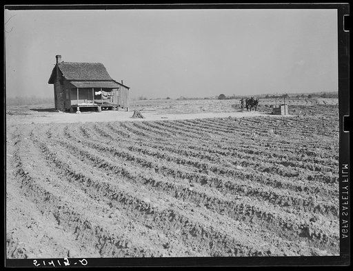 Typical tenant house with bedding airing on porch. Coffee County, Alabama