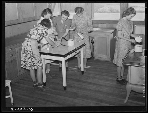 Cooking teacher and group of girls in home economics classroom. Coffee County, Alabama. Goodman School