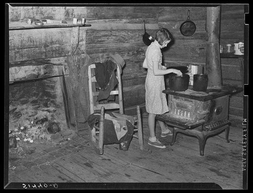 Gladys Smith, thirteen year old girl, who cooks and cares for a family of six. RR  (Rural Rehabilitation) first year (see 51402-D). Coffee County, Alabama