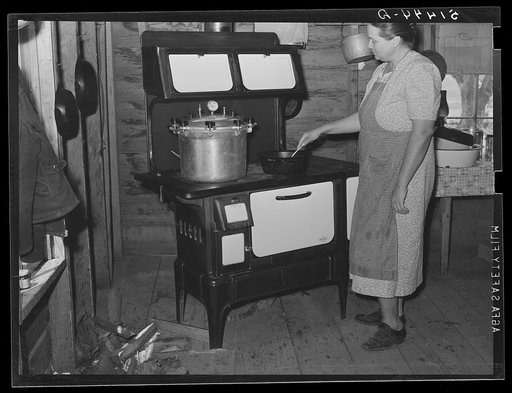 Pressure cooker on Mrs. L.L. LeCompt's new stove bought through FSA (Farm Security Administration) loan. Coffee County, Alabama