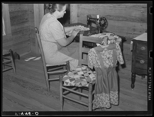 Mrs. L.L. LeCompt stitching quilt squares together. She does all her family sewing. Coffee County, Alabama