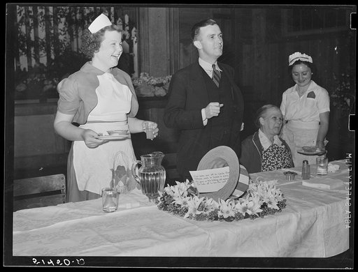 In the auditorium of the Mount Zion School, the Chamber of Commerce of a nearby town is being served dinner by home economics class. Coffee County, Alabama