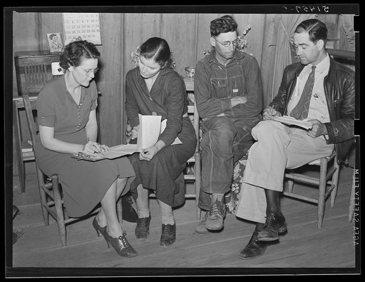 Mr. Ellis and Miss Christian making farm and home plans with Mr. & Mrs. E.H. Wise, RR  (Rural Rehabilitation) family. There are six members in this family; their monthly food check is eight dollars. Total farm and home operating expenses for year is four hundred thirty-five dollars and ninety-five c
