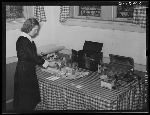 Miss Teal, nurse, testing patient's urine during prenatal clinic. Enterprise, Coffee County, Alabama