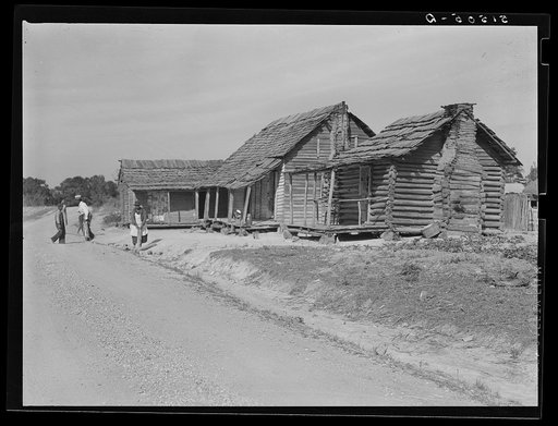 Old type of Gee's Bend, Alabama, home belonging to Mark and Angelina Parker. It is in three sections: guests or company house, sleeping house and kitchen