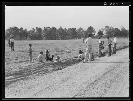 Watching a Saturday afternoon ballgame (the first one). It has been very difficult to start recreational activities because of objections of old preacher. Gee's Bend, Alabama