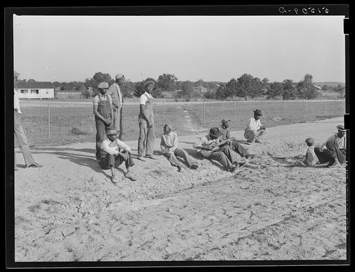 Watching a Saturday afternoon ballgame (the first one). It has been very difficult to start recreational activities because of objections of old preacher. Gee's Bend, Alabama