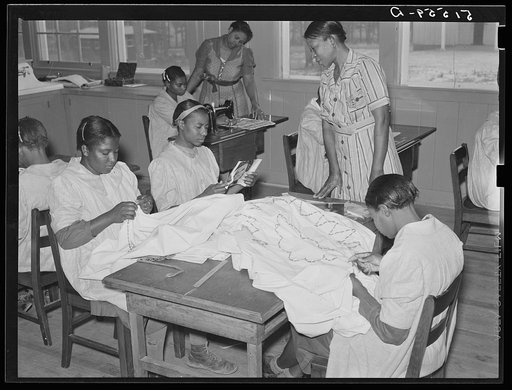 NYA (National Youth Administration) girls making bedspreads under supervision of Juanita Coleman, NYA leader, in school home economics room. Gee's Bend, Alabama