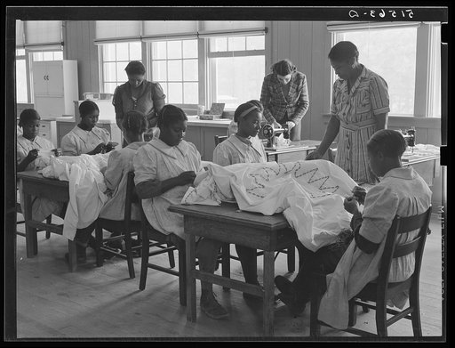 Untitled photo, possibly related to: NYA (National Youth Administration) girls making bedspreads under supervision of Juanita Coleman, NYA leader, in school home economics room. Gee's Bend, Alabama