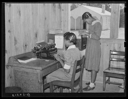 Students learn office and secretarial work by helping principal Robert Pierce. Gee's Bend, Alabama