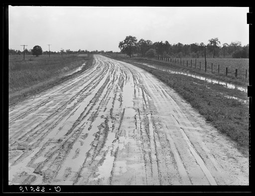 A slick Georgia country road during pause in heavy rain. Near Flint River Farms, Georgia