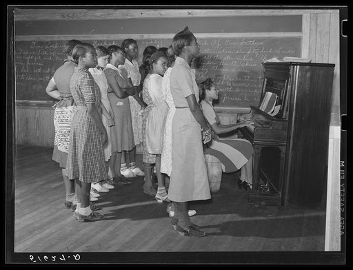 Music class practicing songs for May Day-Health Day festivities. Flint River Farms, Georgia