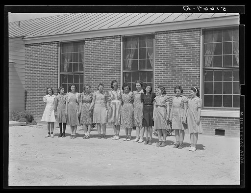 Students wearing dresses they made in home economics class in school at Ashwood Plantations, South Carolina