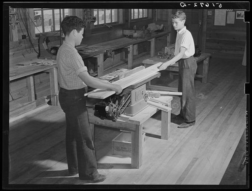 T.A. Davis and Buford Brown at bench saw in shop class. Ashwood Plantations, South Carolina