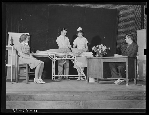 Untitled photo, possibly related to: A scene from a play, "History of Ashwood Health Association," written and presented by tenth grade at May Day-Health Day program. Ashwood Plantations, stage of auditorium, South Carolina