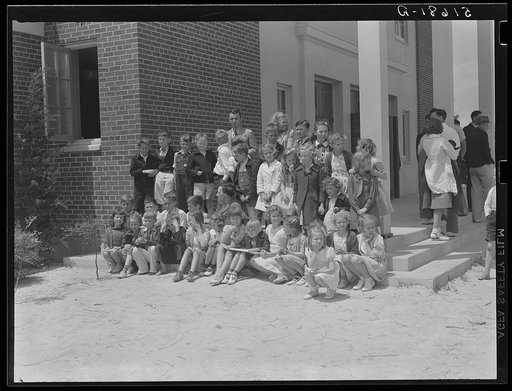 Prize-winning group of students on steps of auditorium after May Day-Health Day program at Ashwood Plantations, South Carolina