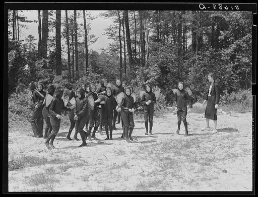 Untitled photo, possibly related to: Sixth and seventh grades rehearsing their play "Flies," written by NYA (National Youth Administration) girls for May Day-Health Day program at Ashwood Plantations, South Carolina