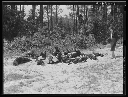 Untitled photo, possibly related to: Sixth and seventh grades rehearsing their play "Flies," written by NYA (National Youth Administration) girls for May Day-Health Day program at Ashwood Plantations, South Carolina