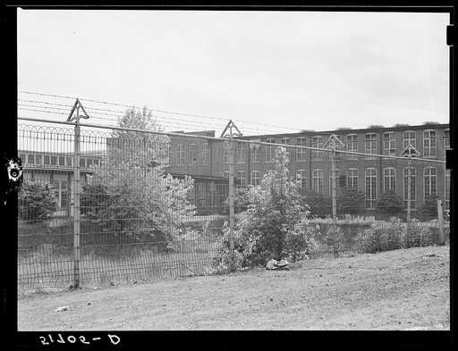 "Tornado" fence at cotton mill. Atlanta, Georgia