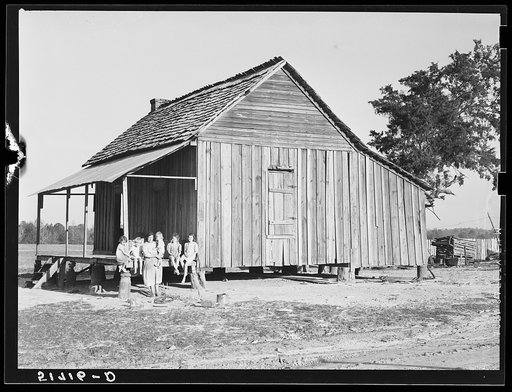 Mrs. Melody Tillery (RR-Rural Rehabilitation family) with her children on porch of their home. Pike County, Alabama