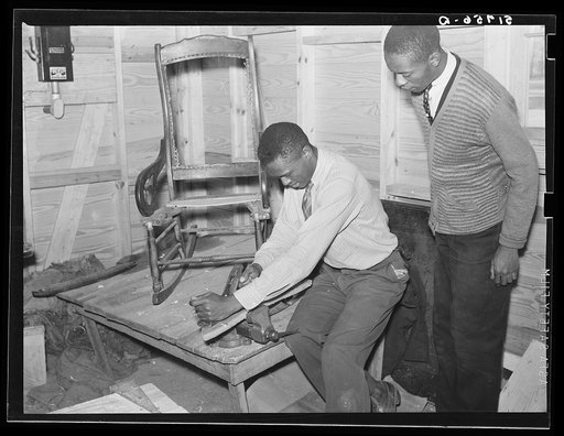 Mending a chair in shop class. Prairie Farms, Alabama