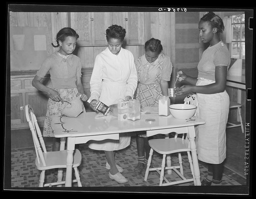 Students with teacher in home economics cooking class. Prairie Farms, Alabama