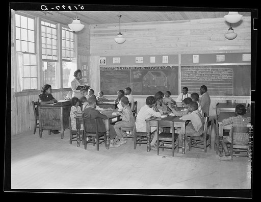 Classroom showing varying ages of students in primary grades in school. Prairie Farms, Alabama