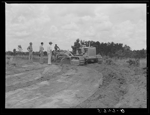 Untitled photo, possibly related to: FSA (Farm Security Administration) supervisors watching terracing of client's land. Greene County, Georgia