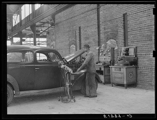 Untitled photo, possibly related to: Testing motors of car in FSA (Farm Security Administration) warehouse depot. Atlanta, Georgia