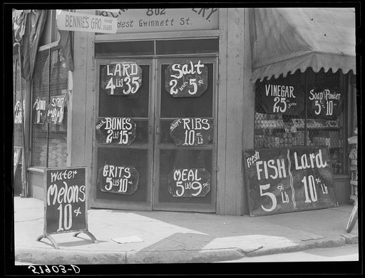 Untitled photo, possibly related to: Negro grocery store. Savannah, Georgia. Prices posted outside