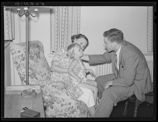 Untitled photo, possibly related to: Doctor examining child in home. Greenbelt, Maryland