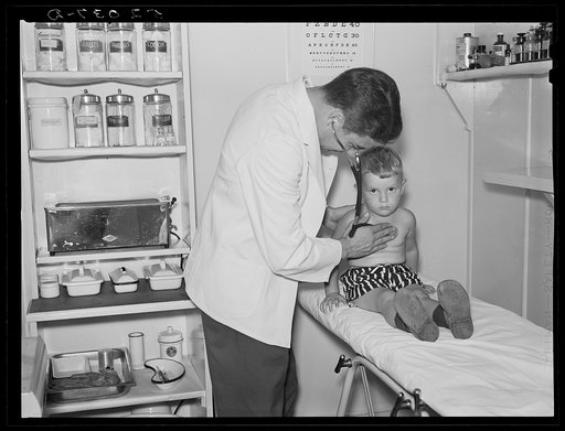 Examining child in medical center. Greenbelt, Maryland
