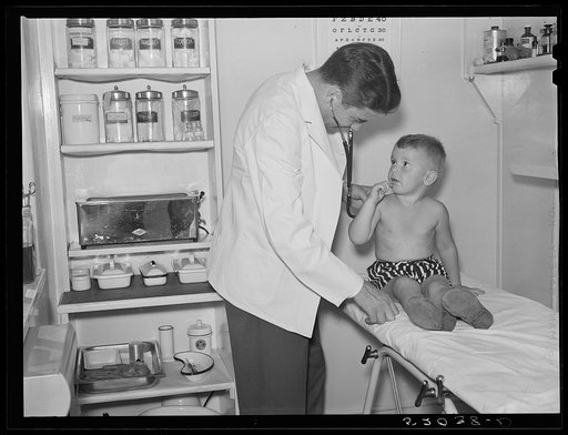 Examining child in medical center. Greenbelt, Maryland