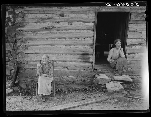 Mrs. Lloyd, ninety-one year-old victim of pellagra, mother of Miss Nettie Lloyd, was born and reared in Orange County and has lived on this spot since her marriage sixty-nine years ago. This is the road leading off from left of Route 54 about four miles west of Carboro. Orange County, North Carolina