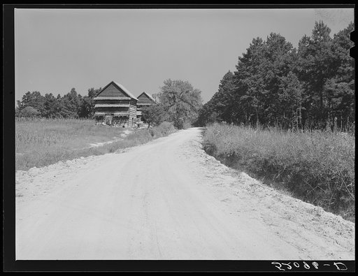 Tobacco barns. Negro owner living in Mebane in prosperous Negro settlement between Carr and Cedar Grove, Orange County, North Carolina. See general notes on subregion. September 28, 1939. Number three