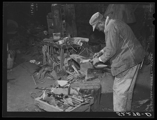 Untitled photo, possibly related to: Uncle George, blacksmith and carpenter who came from prison as a boy to the Marcella Plantation and has lived there for fifty years. Mileston, Mississippi Delta, Mississippi