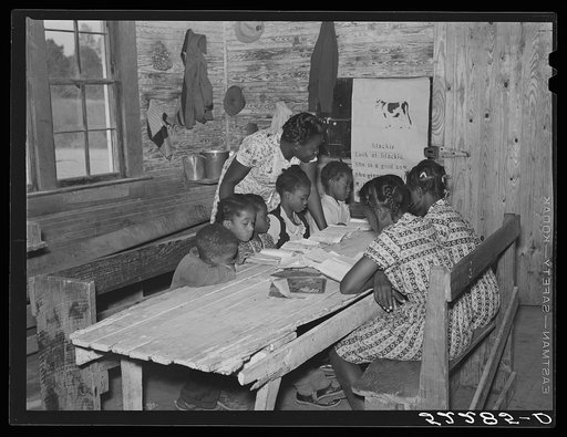 Interior of school on Mileston Plantation. School begins very late in the year and the attendance is poor until December because the children pick cotton. Mileston, Mississippi Delta, Mississippi