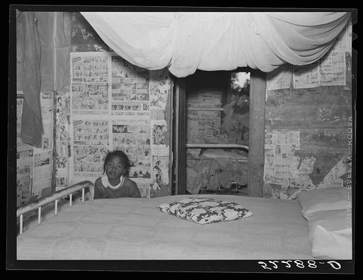 Interior of Negro tenant's home showing mosquito netting over bed. Mileston Plantation, Mississippi Delta, Mississippi