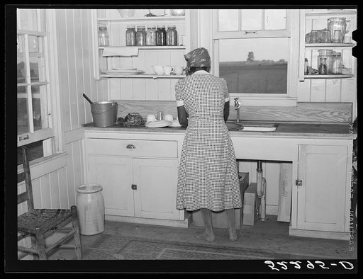 Cube Walker's wife, Negro tenant purchase client, in the kitchen of her new house. Mississippi Delta, Mississippi, Belzoni
