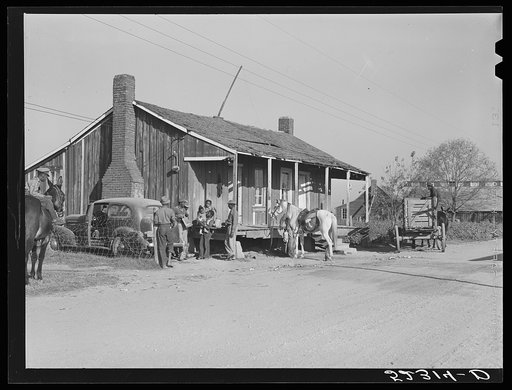 Negro tenant riding boss horse home on Marcella Plantation. Mileston, Mississippi Delta, Mississippi