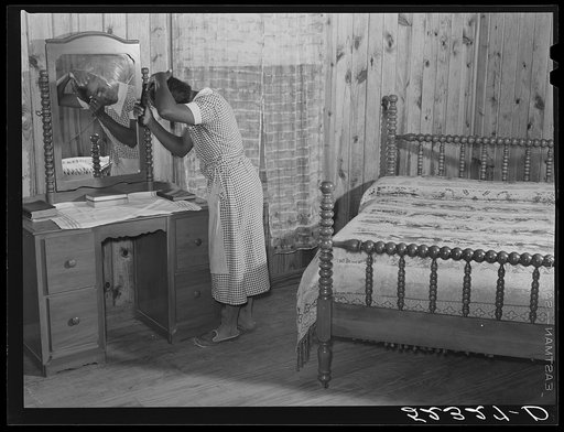 Bedroom showing new furniture in home of Cube Walter, Negro tenant purchase client. Belzoni, Mississippi Delta, Mississippi