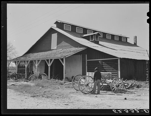 Untitled photo, possibly related to: Uncle George's blacksmith and carpentry shop. He has been on the plantation for fifty years. Marcella Plantation, Mileston, Mississippi